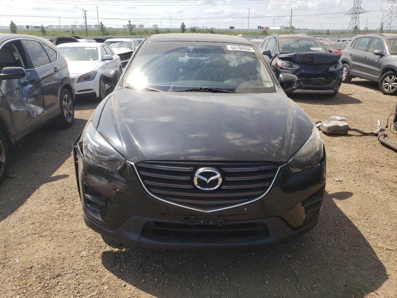 2016 Mazda CX-5 VIN JM3KE2CY6G0632218 Copart auction photo, all over damage thumbnail 5