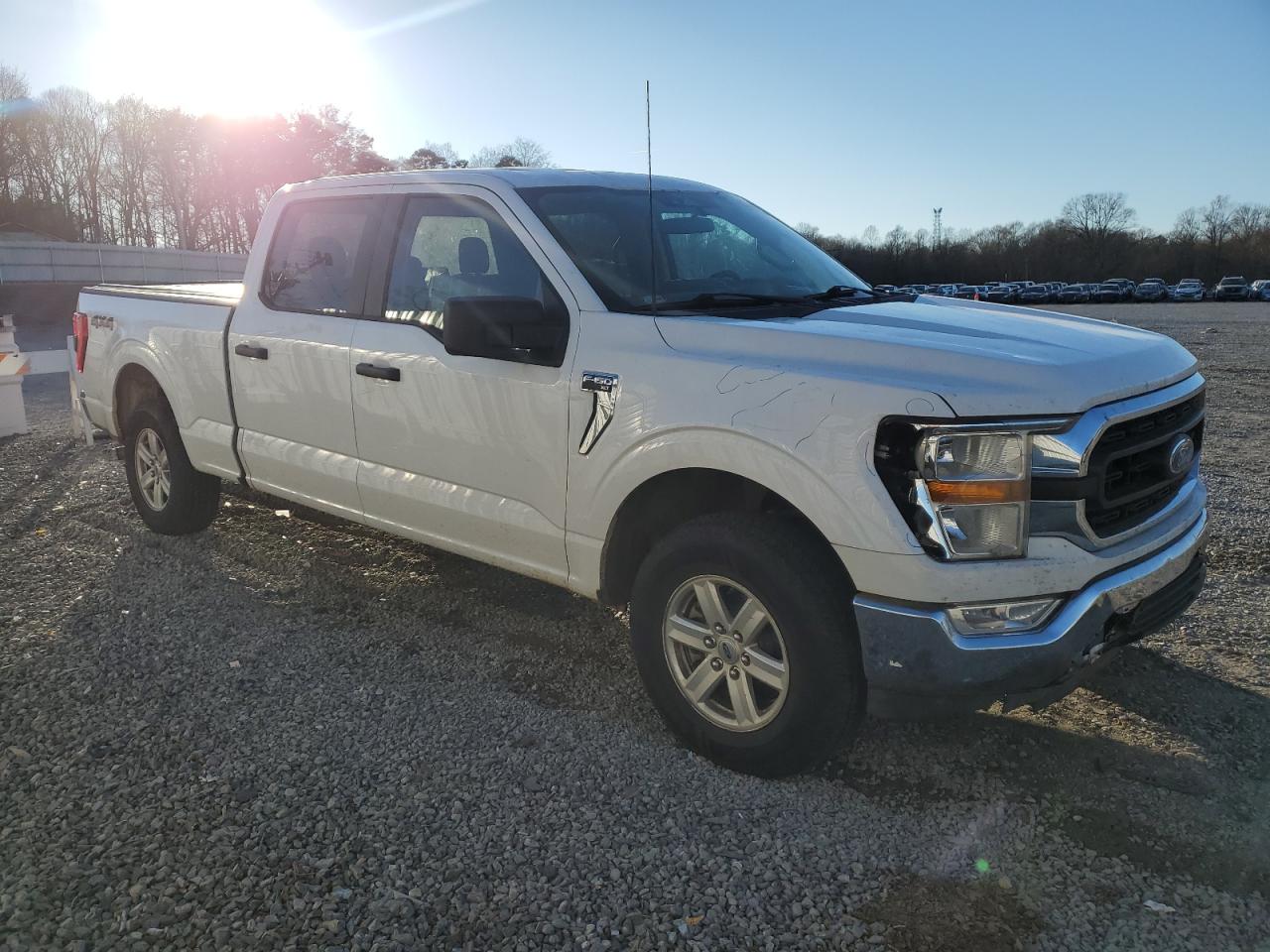 2022 Ford F-150 VIN 1FTFW1E54NKE66710 Copart auction photo, front end / side damage thumbnail 4