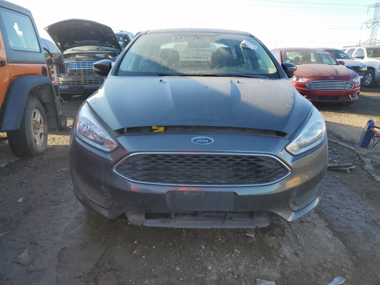 2017 Ford Focus VIN 1FADP3F25HL215798 Copart auction photo, rear end / minor dent/scratches damage thumbnail 5