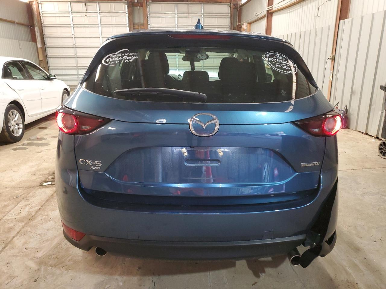 2020 Mazda CX-5 VIN JM3KFBBM4L0799974 Copart auction photo, side damage thumbnail 6