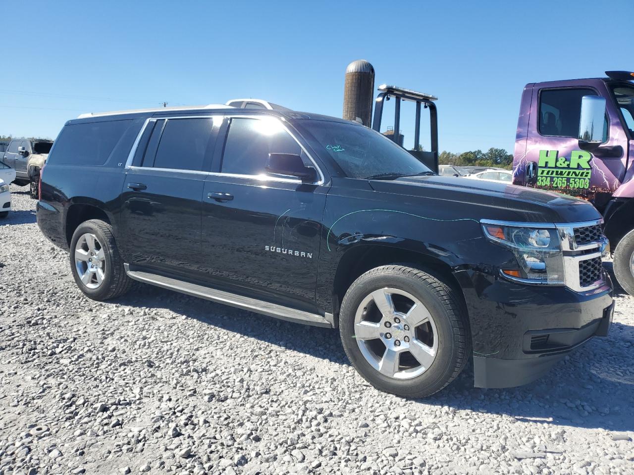 2015 Chevrolet Suburban VIN 1GNSCJKC0FR241999 Copart auction photo, front end damage thumbnail 4
