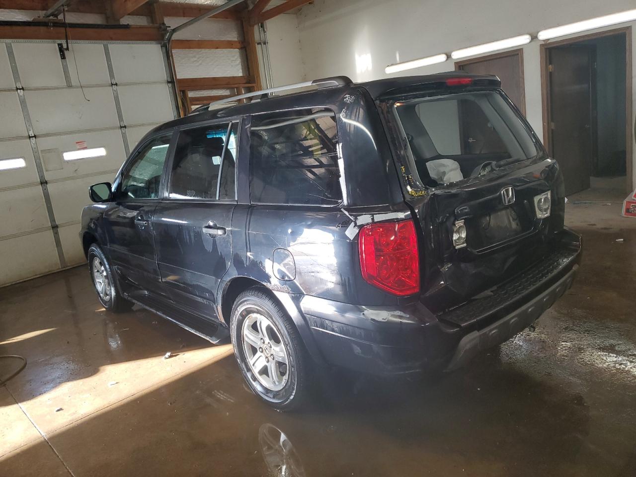 2003 Honda Pilot VIN 2HKYF18633H594395 Copart auction photo, rear end damage thumbnail 2