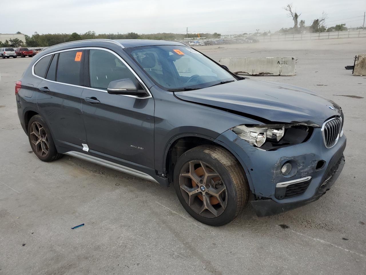 2017 BMW X1 VIN WBXHT3C30H5F72112 Copart auction photo, water/flood / all over damage thumbnail 4