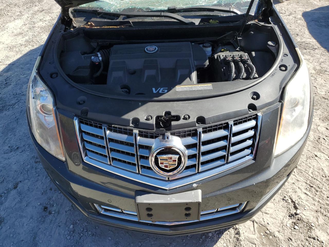 2016 Cadillac SRX VIN 3GYFNCE33GS567073 Copart auction photo, all over damage thumbnail 12
