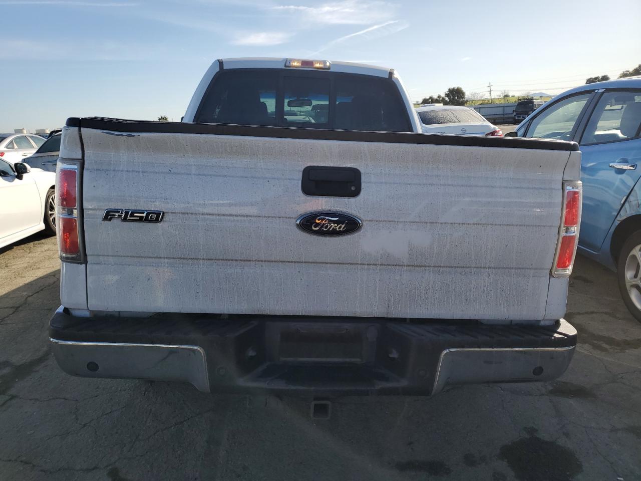 2012 Ford F-150 VIN 1FTEX1CM4CFD00390 Copart auction photo, front end / side damage thumbnail 6