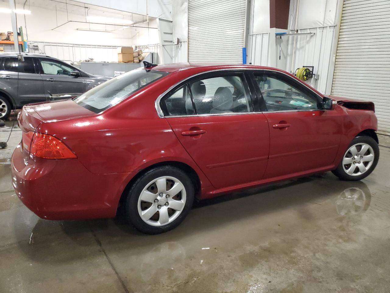 2009 KIA Optima VIN KNAGE228895324048 Copart auction photo, front end damage thumbnail 3
