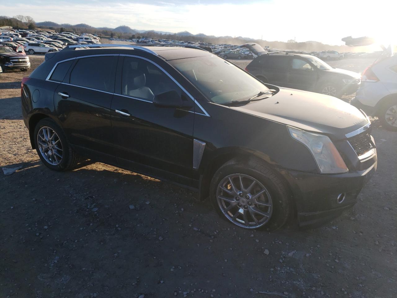 2015 Cadillac SRX VIN 3GYFNCE36FS526399 Copart auction photo, front end damage thumbnail 4