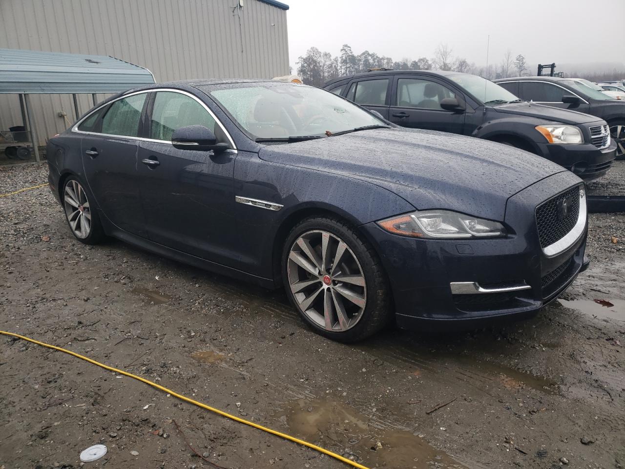 2018 Jaguar XJ VIN SAJWJ1CD4J8W13822 Copart auction photo, side / front end damage thumbnail 4