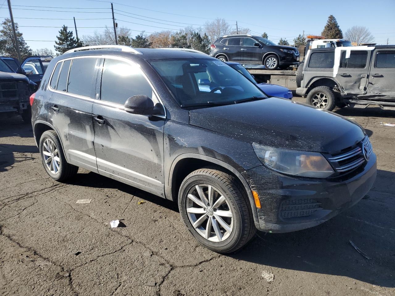 2017 Volkswagen Tiguan VIN WVGSV7AX5HK004717 Copart auction photo, all over damage thumbnail 4