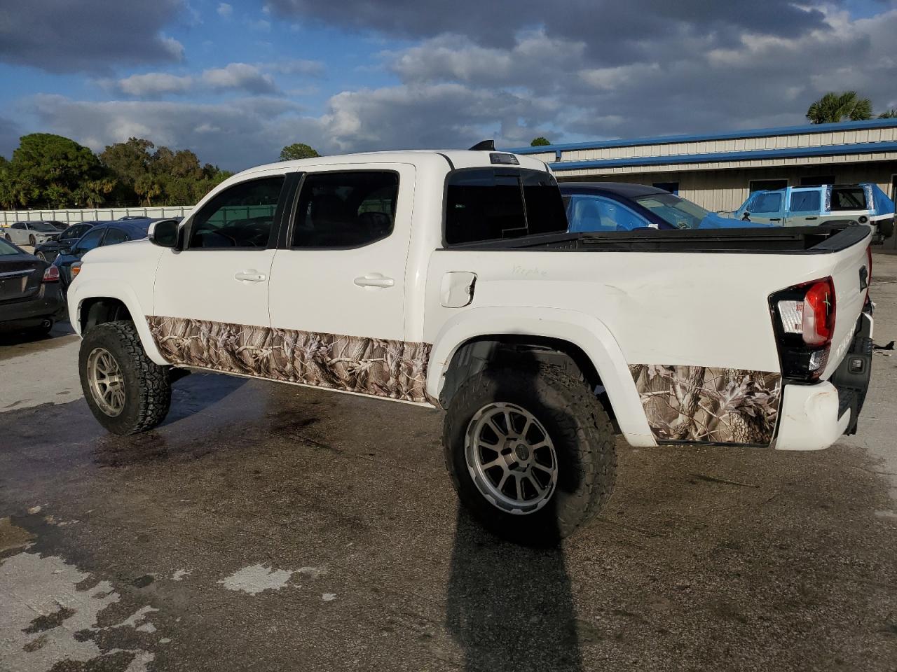 2019 Toyota Tacoma VIN 3TMAZ5CN0KM080382 Copart auction photo, rear end / undercarriage damage thumbnail 2