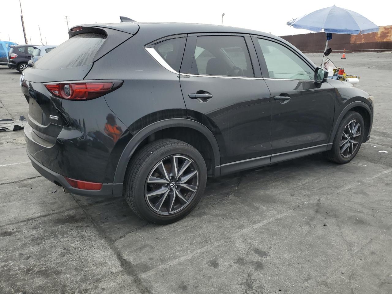 2018 Mazda CX-5 VIN JM3KFADM1J0312850 Copart auction photo, undercarriage / front end damage thumbnail 3