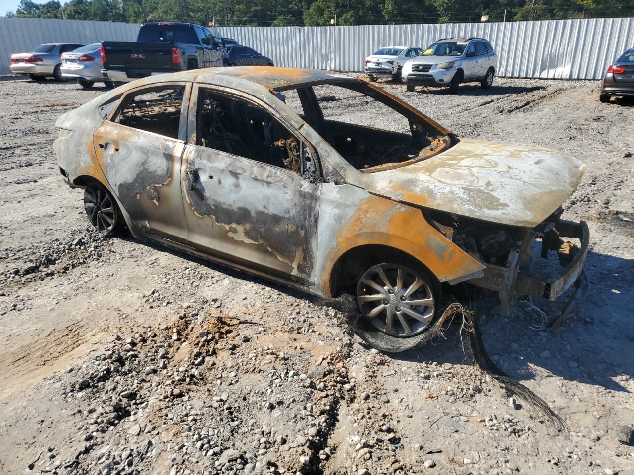 2022 Hyundai Accent VIN 3KPC24A63NE166173 Copart auction photo, burn damage thumbnail 4