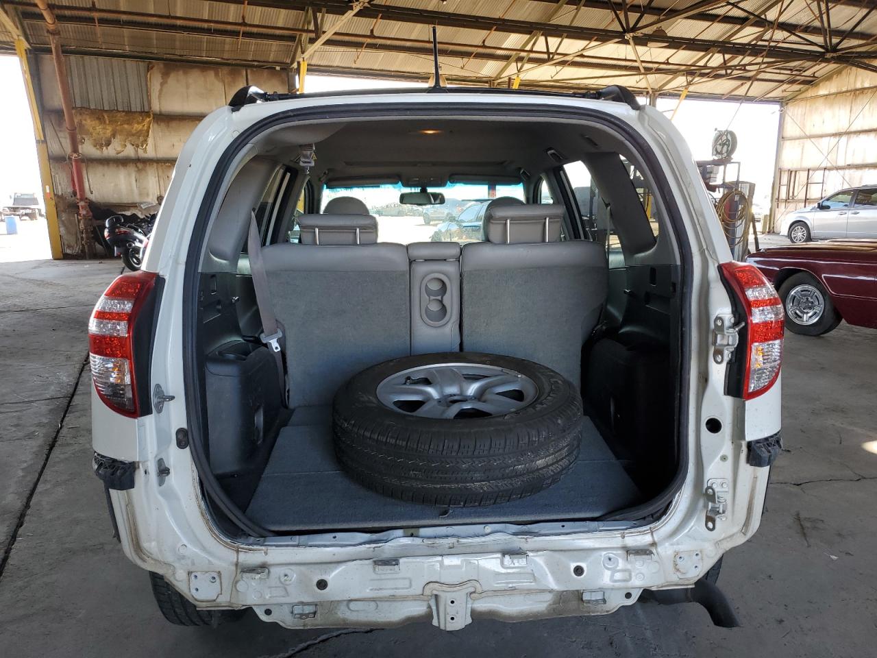 2010 Toyota RAV 4 VIN 2T3DK4DV2AW018991 Copart auction photo, rear end damage thumbnail 6