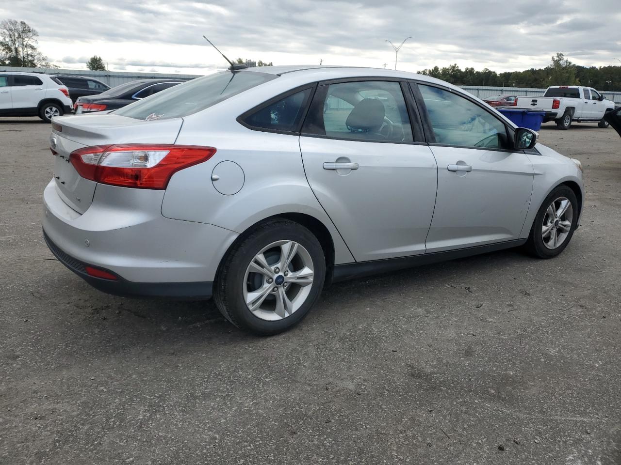 2014 Ford Focus VIN 1FADP3F24EL243250 Copart auction photo, front end / undercarriage damage thumbnail 3