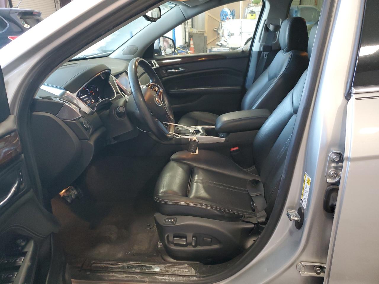 2014 Cadillac SRX VIN 3GYFNBE36ES552199 Copart auction photo, front end damage thumbnail 7