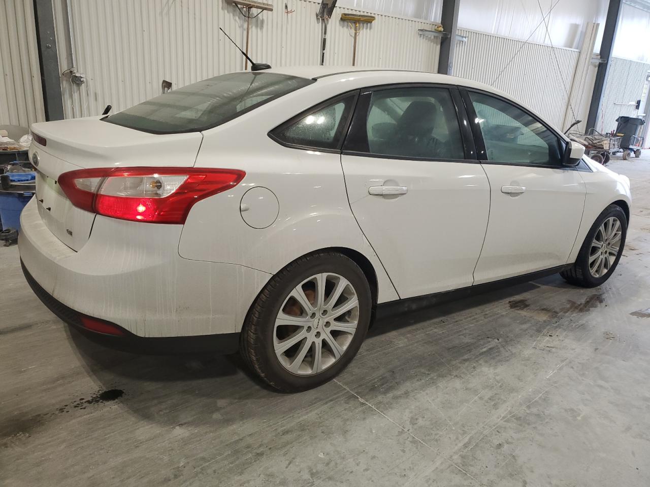2012 Ford Focus VIN 1FAHP3F2XCL280057 Copart auction photo, undercarriage / side damage thumbnail 3