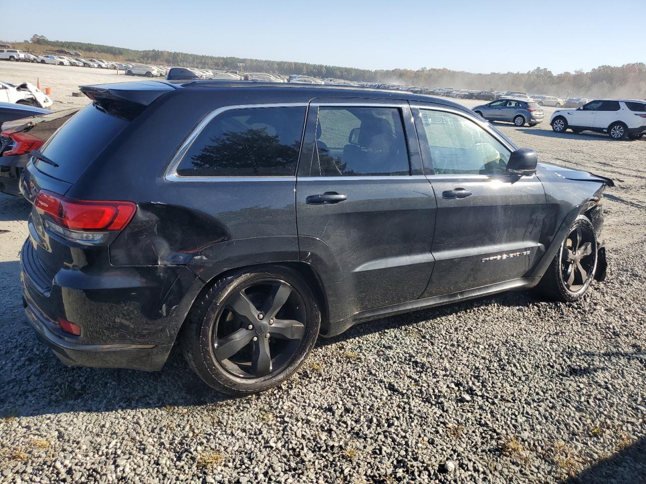 2015 Jeep Grand Cherokee VIN 1C4RJFCG8FC154799 Copart auction photo, front end / side damage thumbnail 3