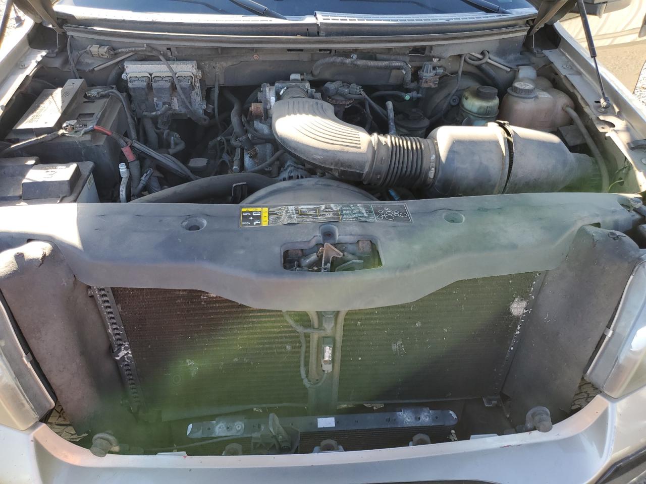 2004 Ford F-150 VIN 1FTRW12W74KD15613 Copart auction photo, front end / side damage thumbnail 12