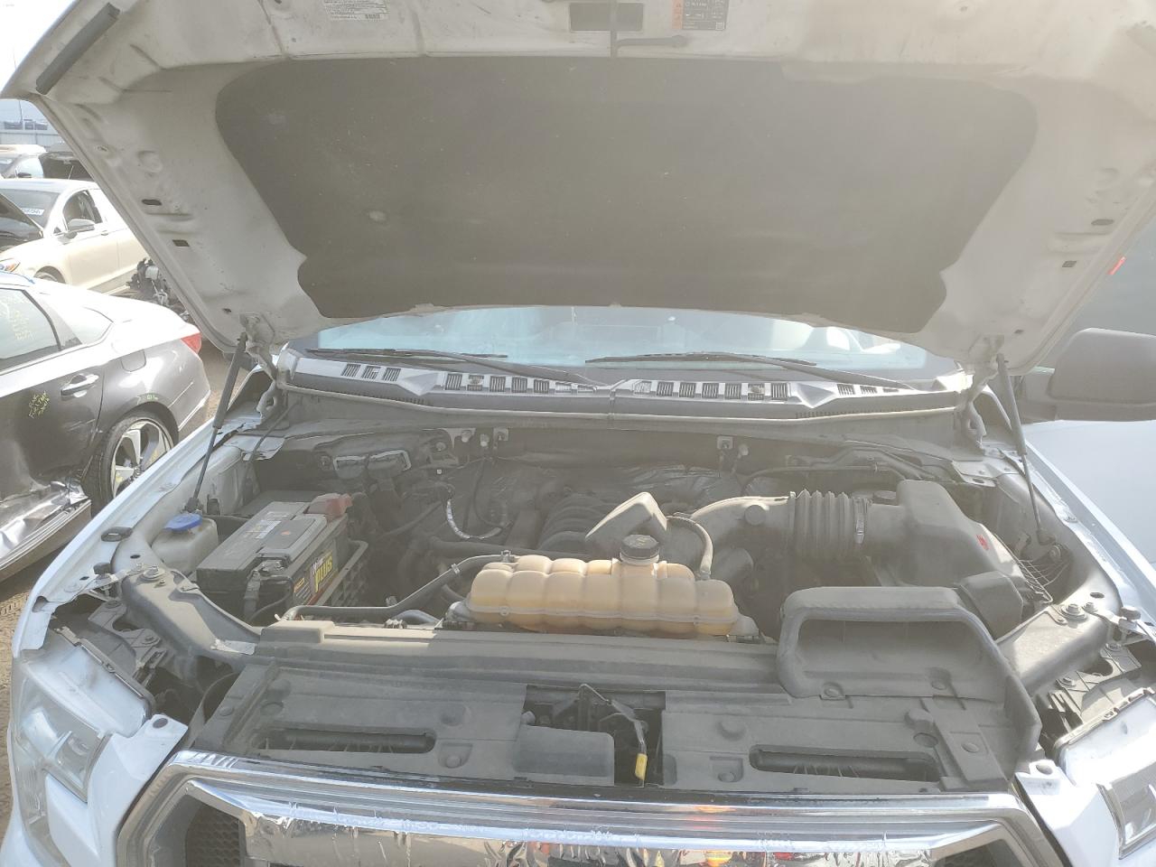 2015 Ford F-150 VIN 1FTEW1EF4FKD83512 Copart auction photo, minor dent/scratches damage thumbnail 11
