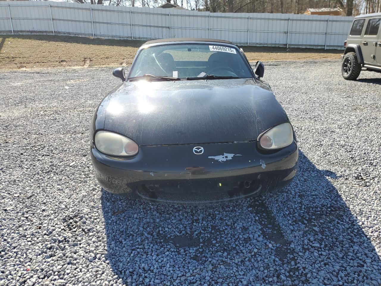 1999 Mazda MX-5 VIN JM1NB3534X0136209 Copart auction photo, front end damage thumbnail 5