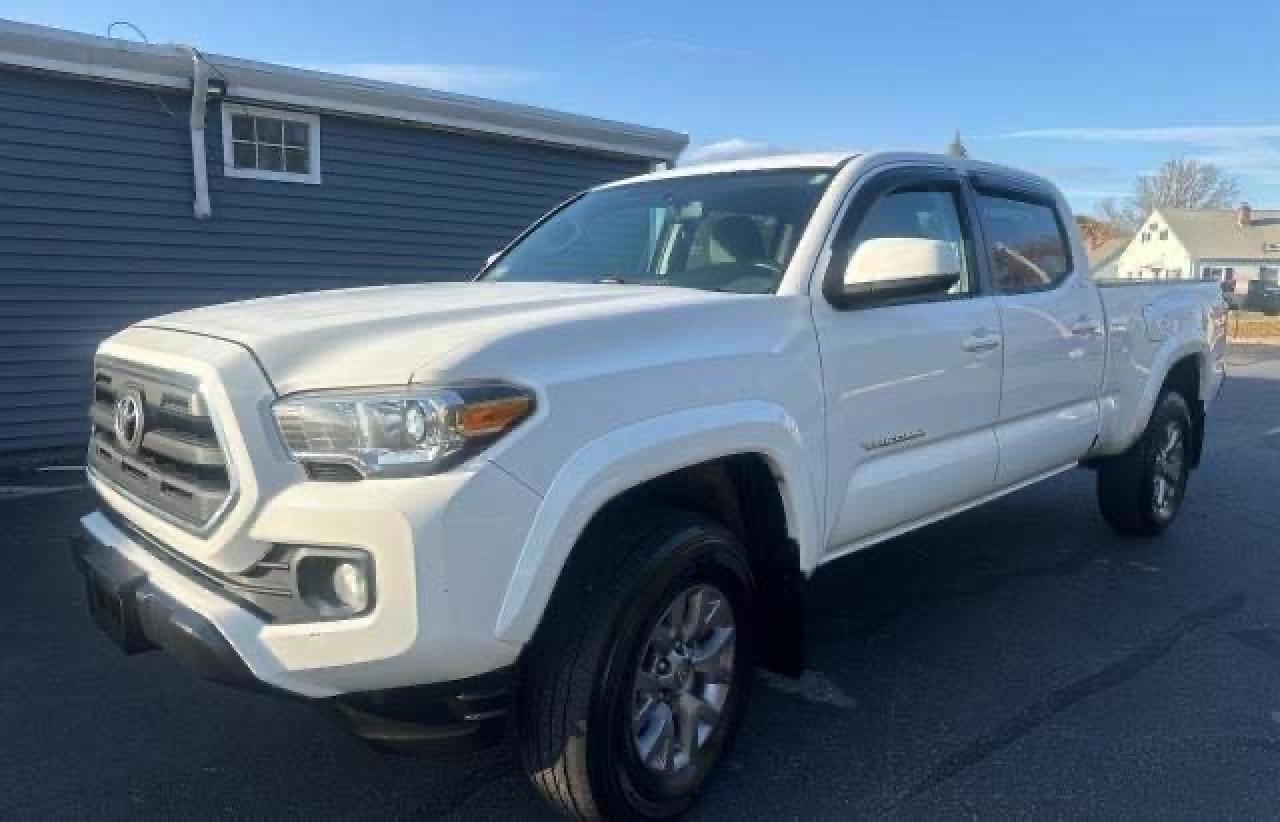2017 Toyota Tacoma VIN 3TMDZ5BN1HM015080 Copart auction photo, normal wear damage thumbnail 2