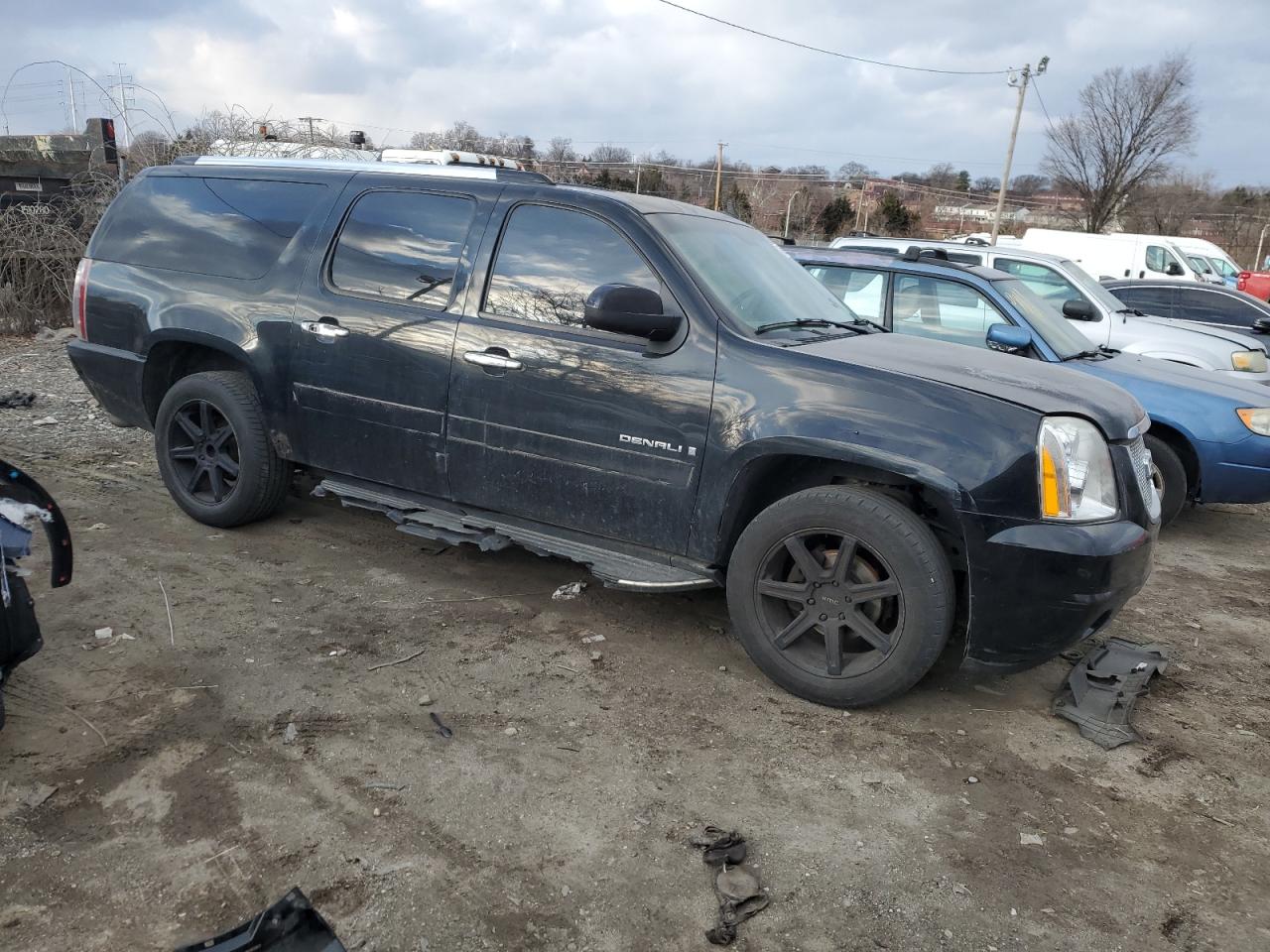 2007 GMC Yukon VIN 1GKFK66877J392830 Copart auction photo, front end / side damage thumbnail 4