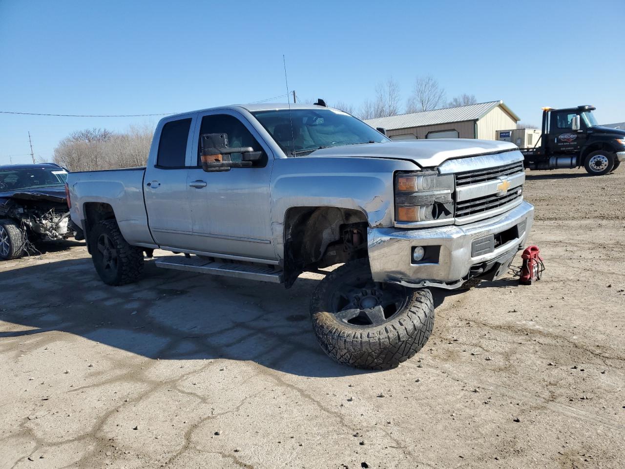 2015 Chevrolet Silverado VIN 1GC2KVEG3FZ554711 Copart auction photo, front end / side damage thumbnail 4