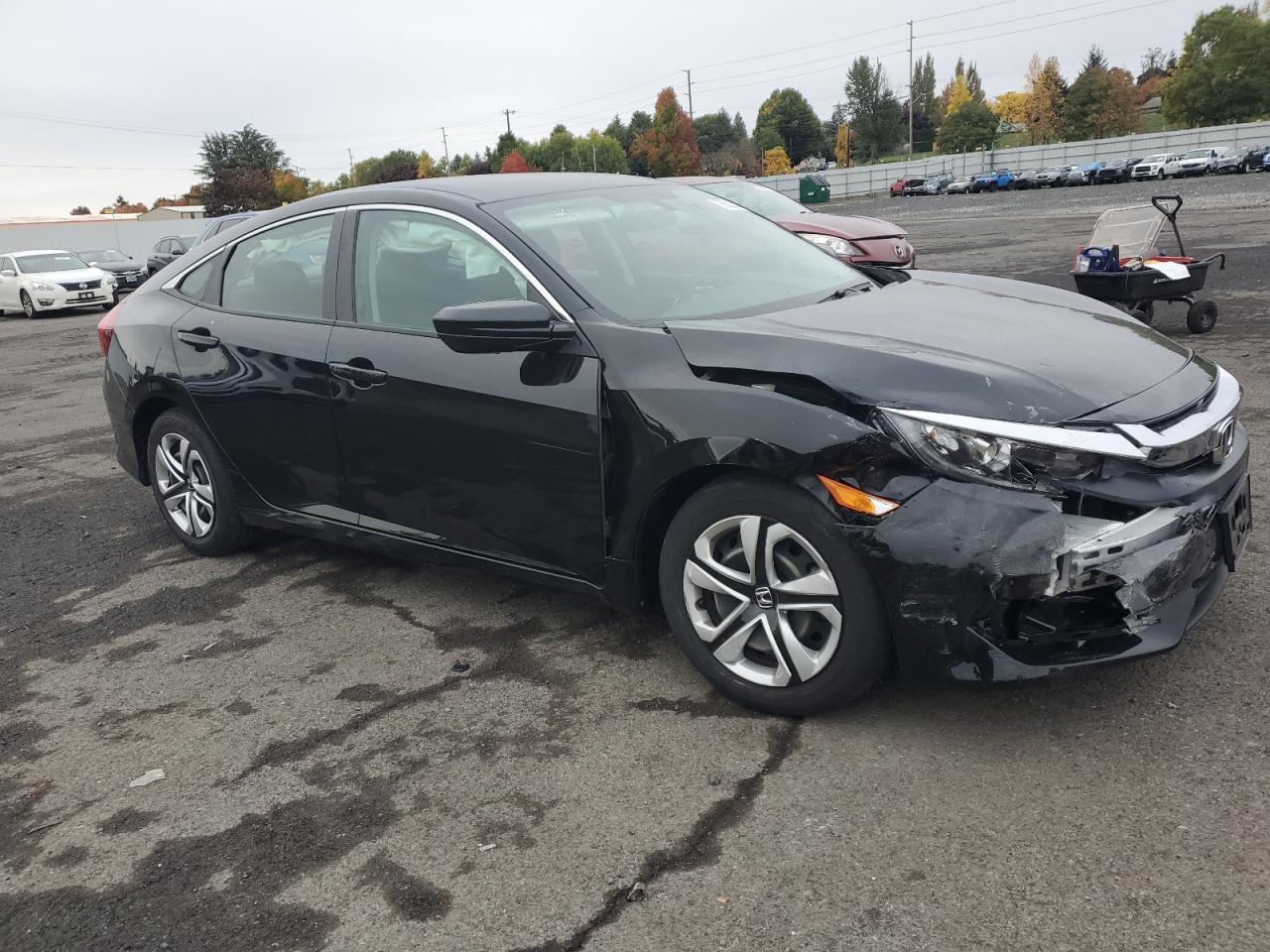 2018 Honda Civic VIN 2HGFC2F55JH510181 Copart auction photo, front end / minor dent/scratches damage thumbnail 4