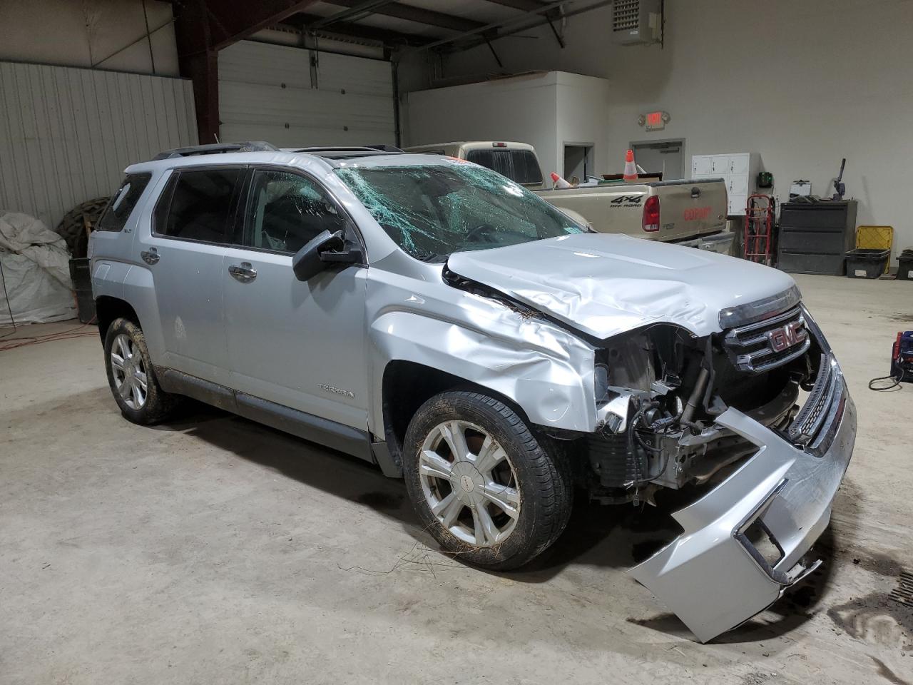 2016 GMC Terrain VIN 2GKFLUE39G6342449 Copart auction photo, rollover damage thumbnail 4