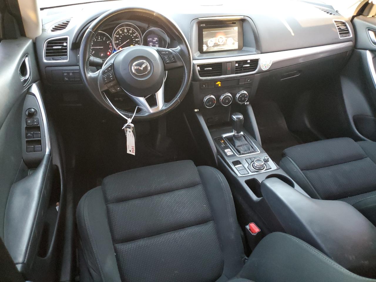 2016 Mazda CX-5 VIN JM3KE2CY8G0756538 Copart auction photo, side / front end damage thumbnail 8