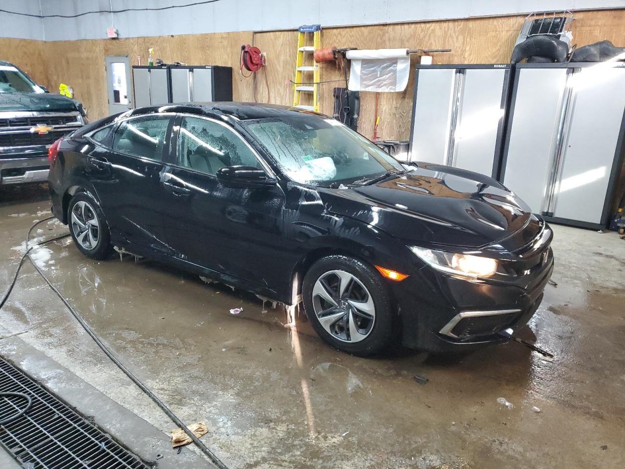 2019 Honda Civic VIN 2HGFC2F69KH603201 Copart auction photo, front end / minor dent/scratches damage thumbnail 4