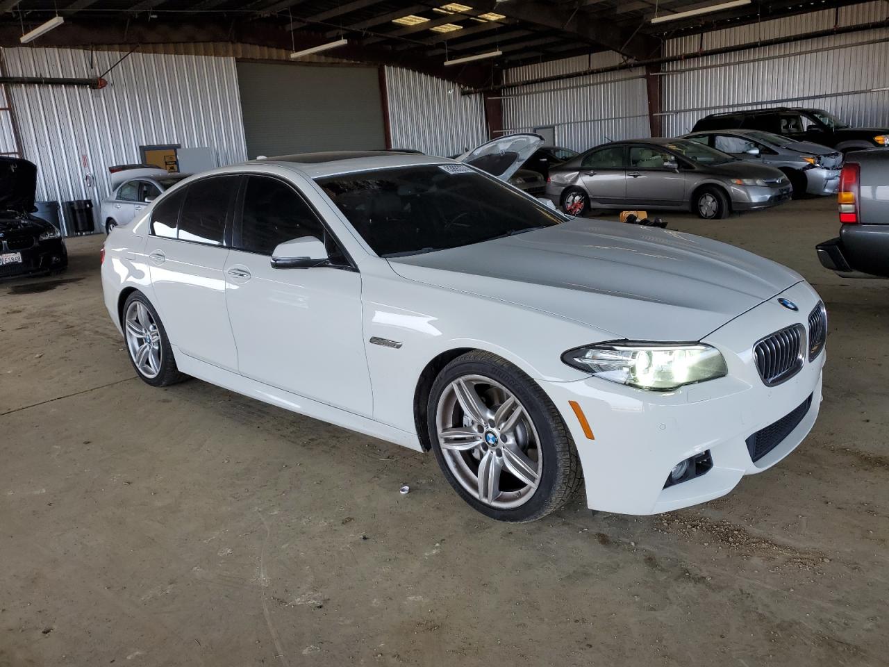 2015 BMW 5er VIN WBA5B1C5XFD918138 Copart auction photo, rear end damage thumbnail 4