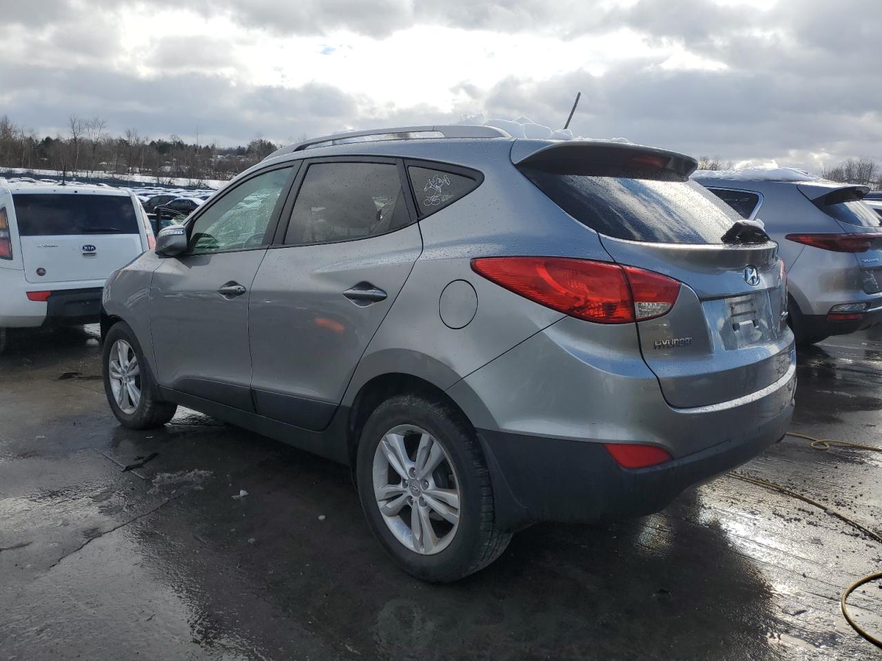 2013 Hyundai Tucson VIN KM8JUCAC2DU784453 Copart auction photo, side / front end damage thumbnail 2
