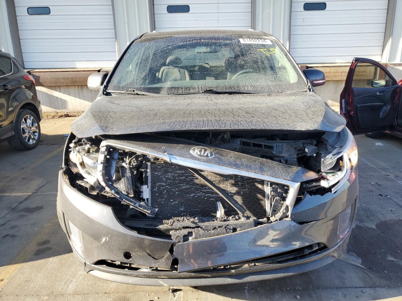 2016 KIA Sedona VIN KNDMB5C1XG6113894 Copart auction photo, front end / minor dent/scratches damage thumbnail 5