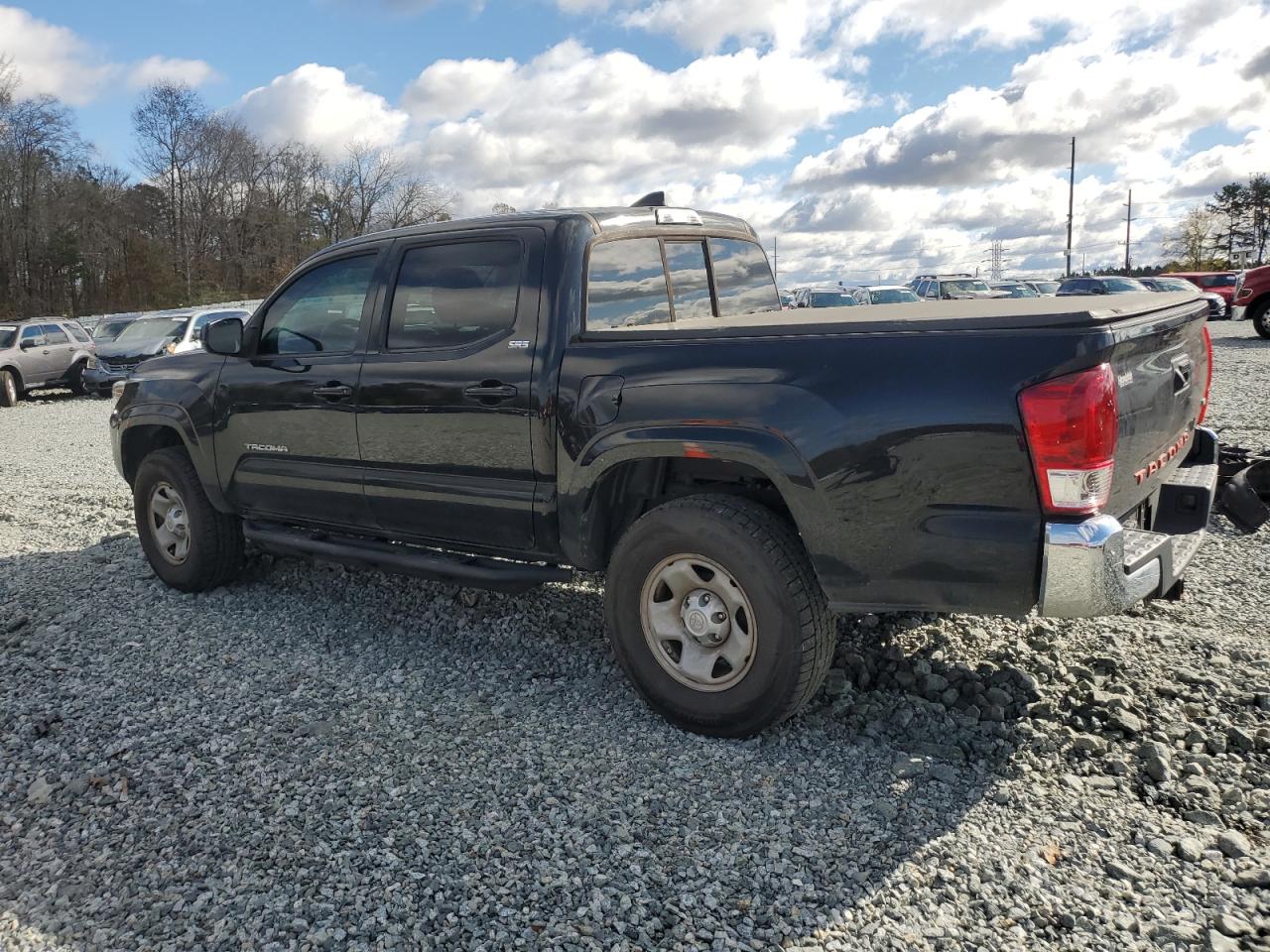 2016 Toyota Tacoma VIN 5TFAZ5CN5GX005033 Copart auction photo, vandalism / minor dent/scratches damage thumbnail 2