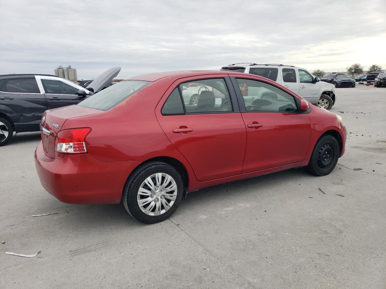 2012 Toyota Yaris VIN JTDBT4K37CL024541 Copart auction photo, front end / side damage thumbnail 3