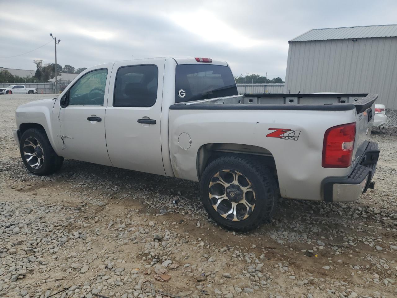 2010 Chevrolet Silverado VIN 3GCRKSE34AG101099 Copart auction photo, front end / side damage thumbnail 2
