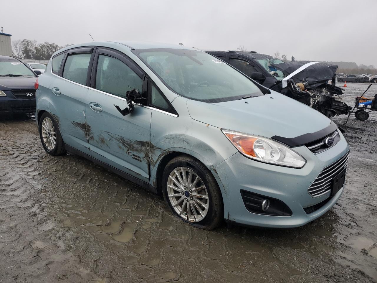 2014 Ford C-MAX VIN 1FADP5CU5EL502832 Copart auction photo, side / front end damage thumbnail 4