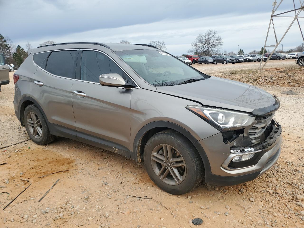 2017 Hyundai Santa Fe VIN 5NMZU3LB1HH027651 Copart auction photo, front end damage thumbnail 4