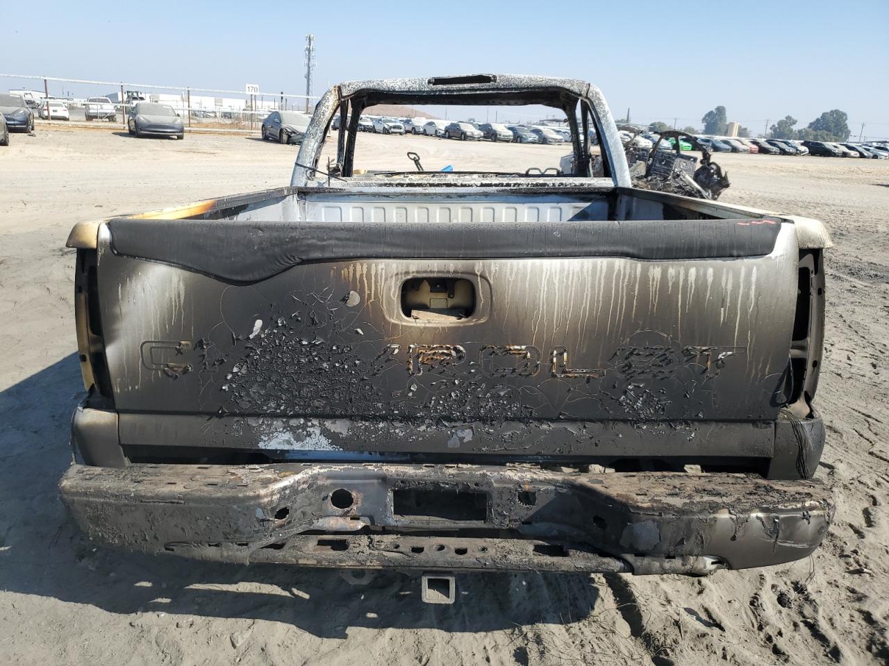 2003 Chevrolet Silverado VIN 1GCEC14X03Z168733 Copart auction photo, burn damage thumbnail 10