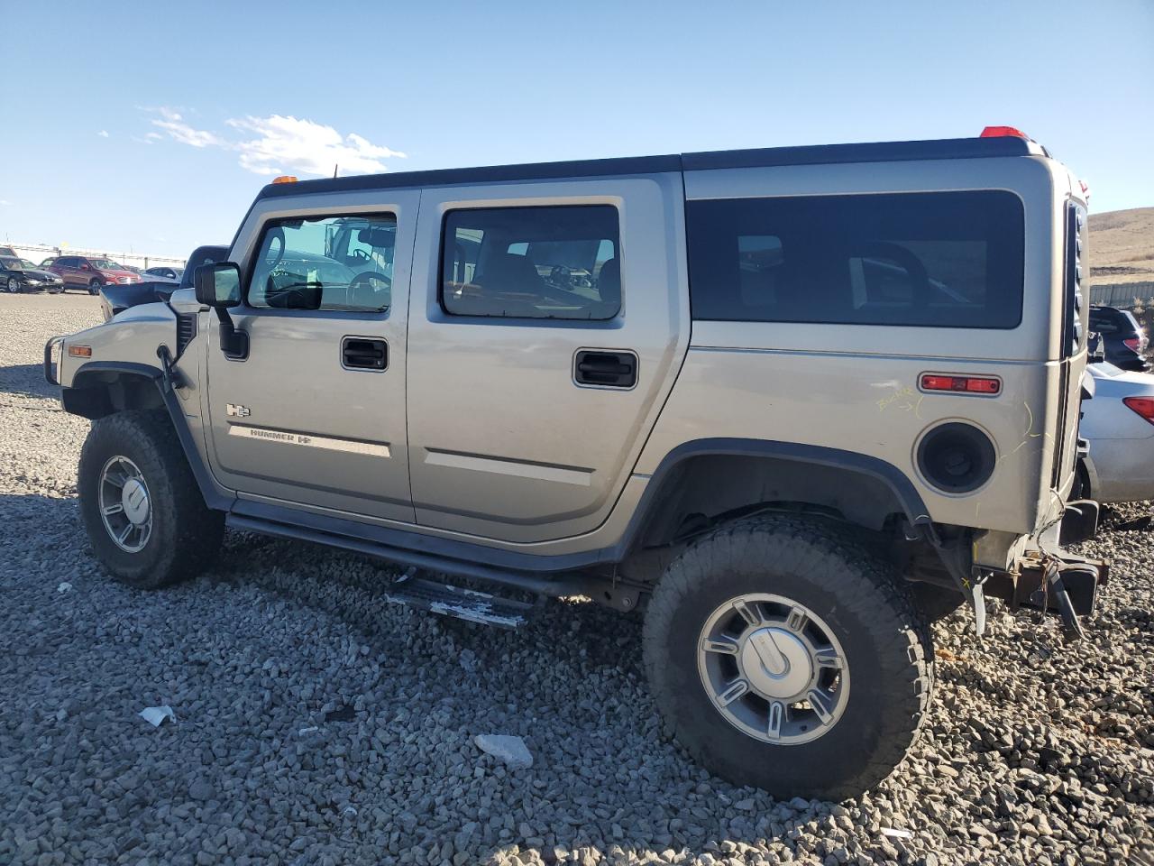 2003 Hummer H2 VIN 5GRGN23UX3H140703 Copart auction photo, rear end damage thumbnail 2