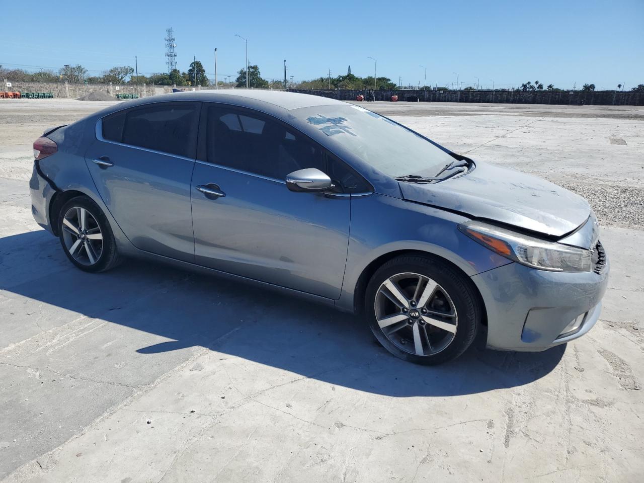 2017 KIA Forte VIN 3KPFL4A87HE005583 Copart auction photo, rear end / front end damage thumbnail 4