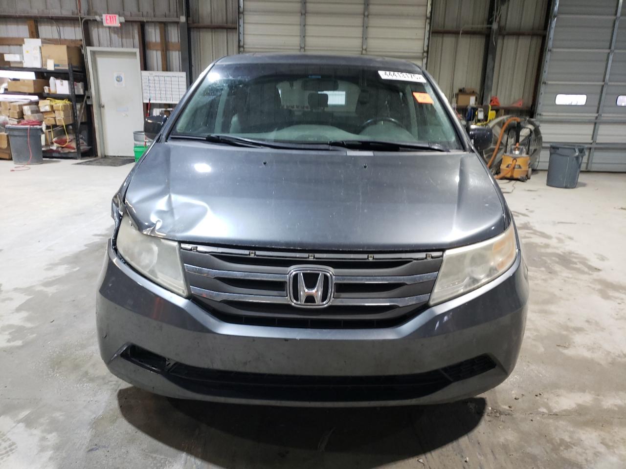 2011 Honda Odyssey VIN 5FNRL5H6XBB027442 Copart auction photo, front end / side damage thumbnail 5