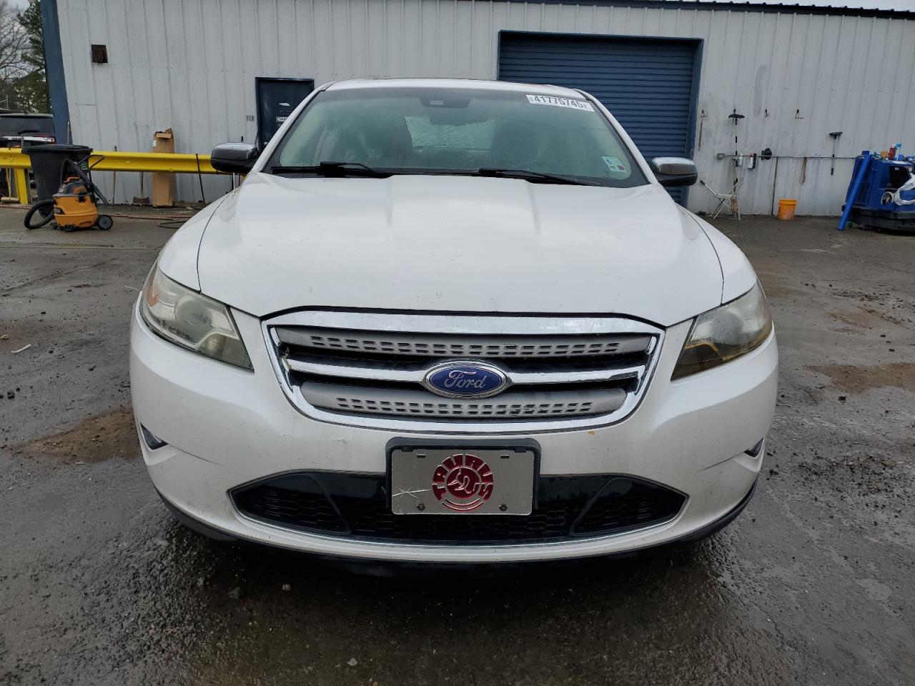 2012 Ford Taurus VIN 1FAHP2FW1CG126830 Copart auction photo, side damage thumbnail 5