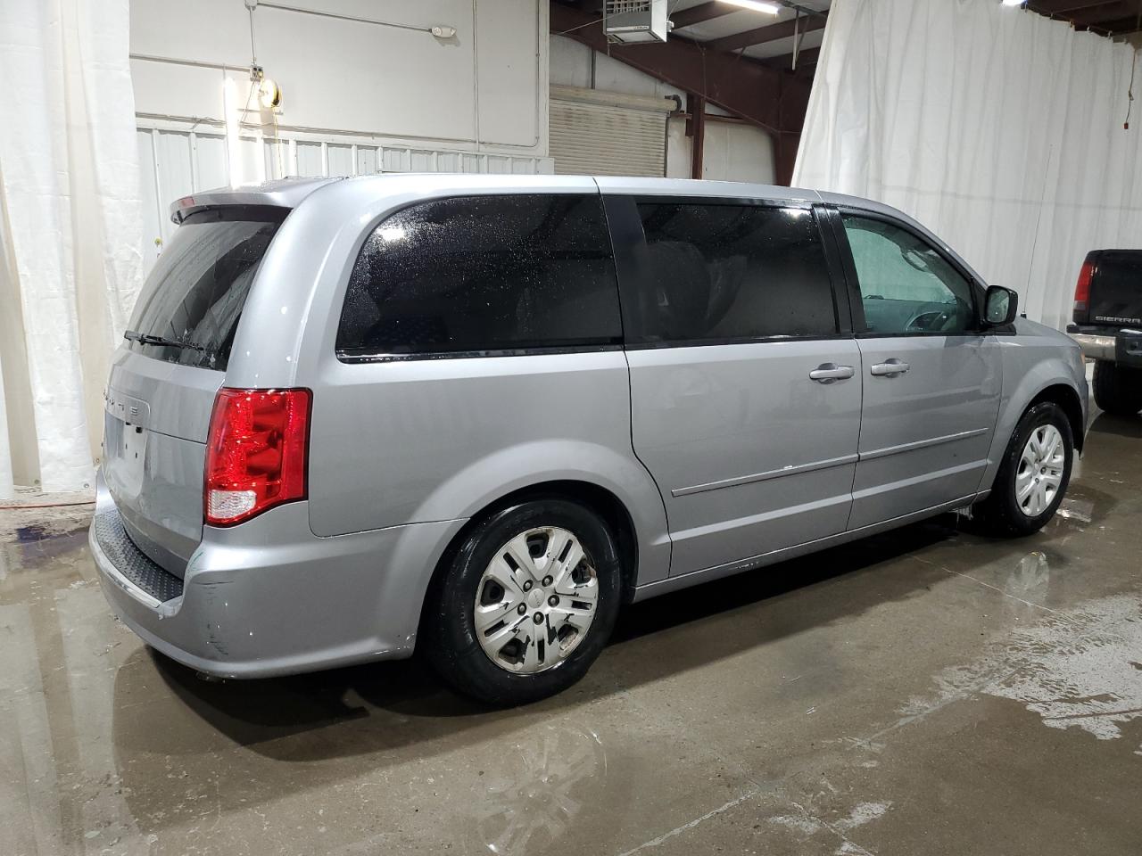 2014 Dodge Caravan VIN 2C4RDGBG0ER141128 Copart auction photo, side / rear end damage thumbnail 3