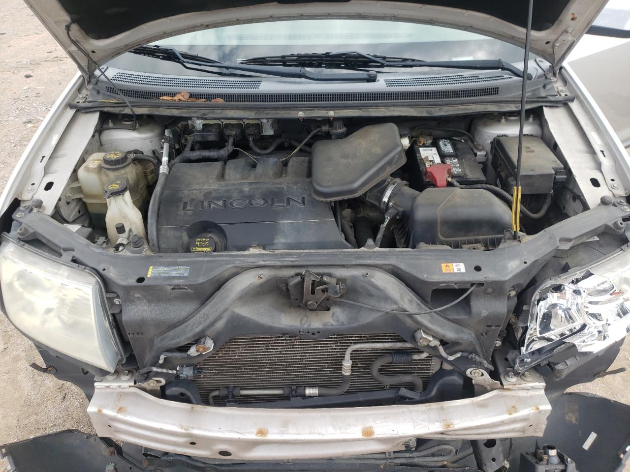2010 Lincoln MKX VIN 2LMDJ8JC6ABJ16082 Copart auction photo, front end / side damage thumbnail 12