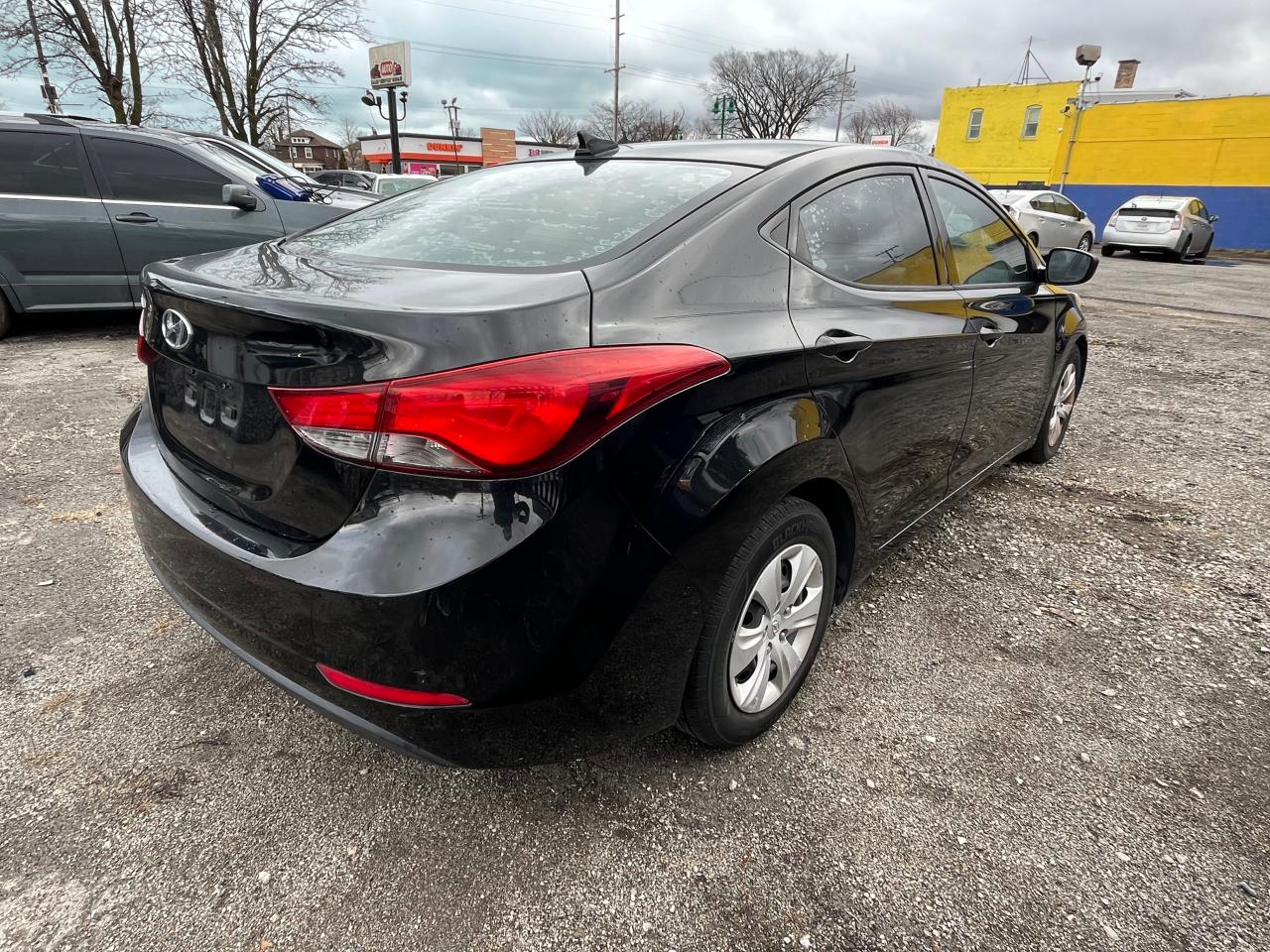 2016 Hyundai Elantra VIN 5NPDH4AE0GH669281 Copart auction photo, minor dent/scratches / normal wear damage thumbnail 4