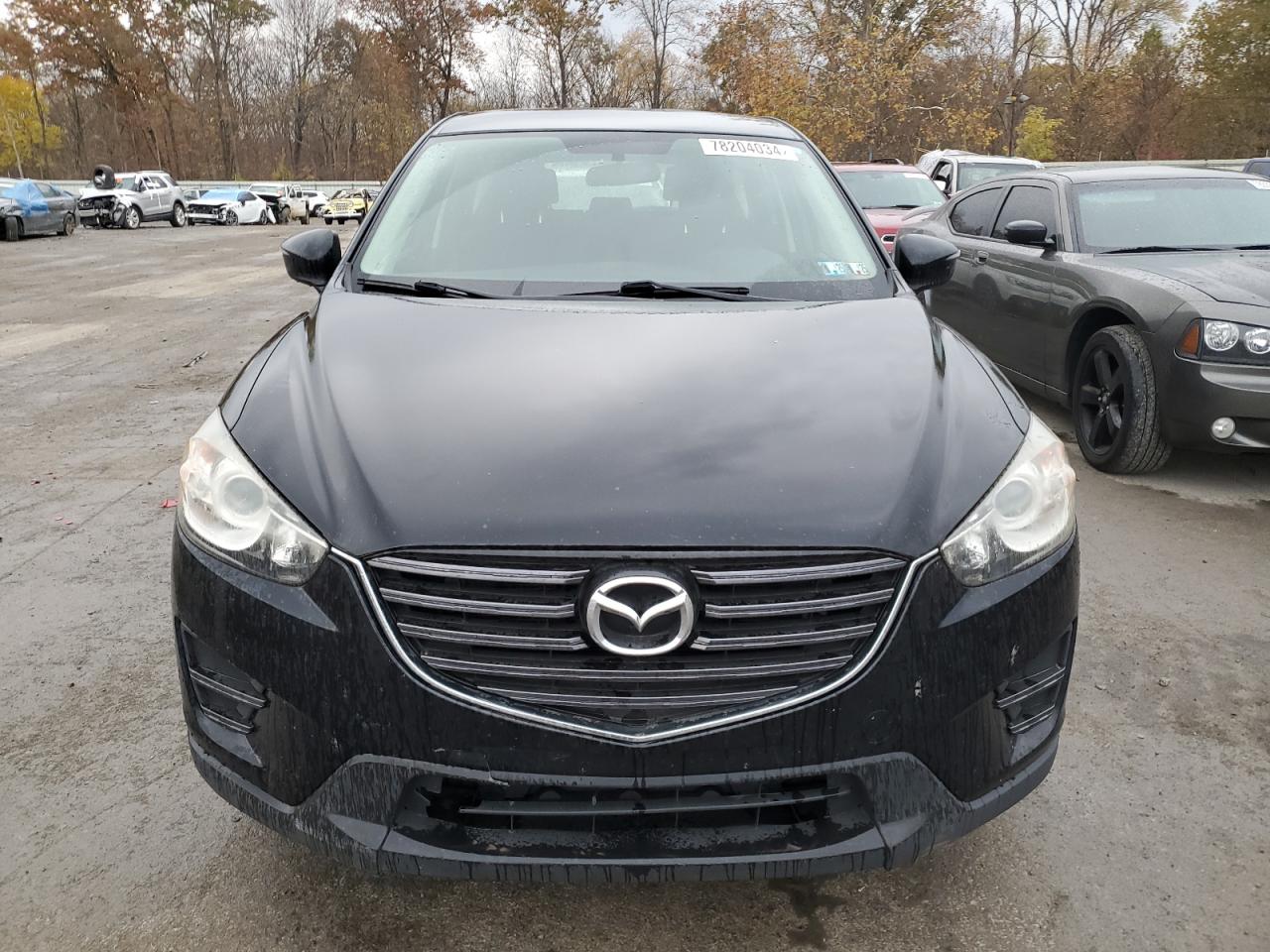 2016 Mazda CX-5 VIN JM3KE4BY2G0745273 Copart auction photo, front end / side damage thumbnail 5