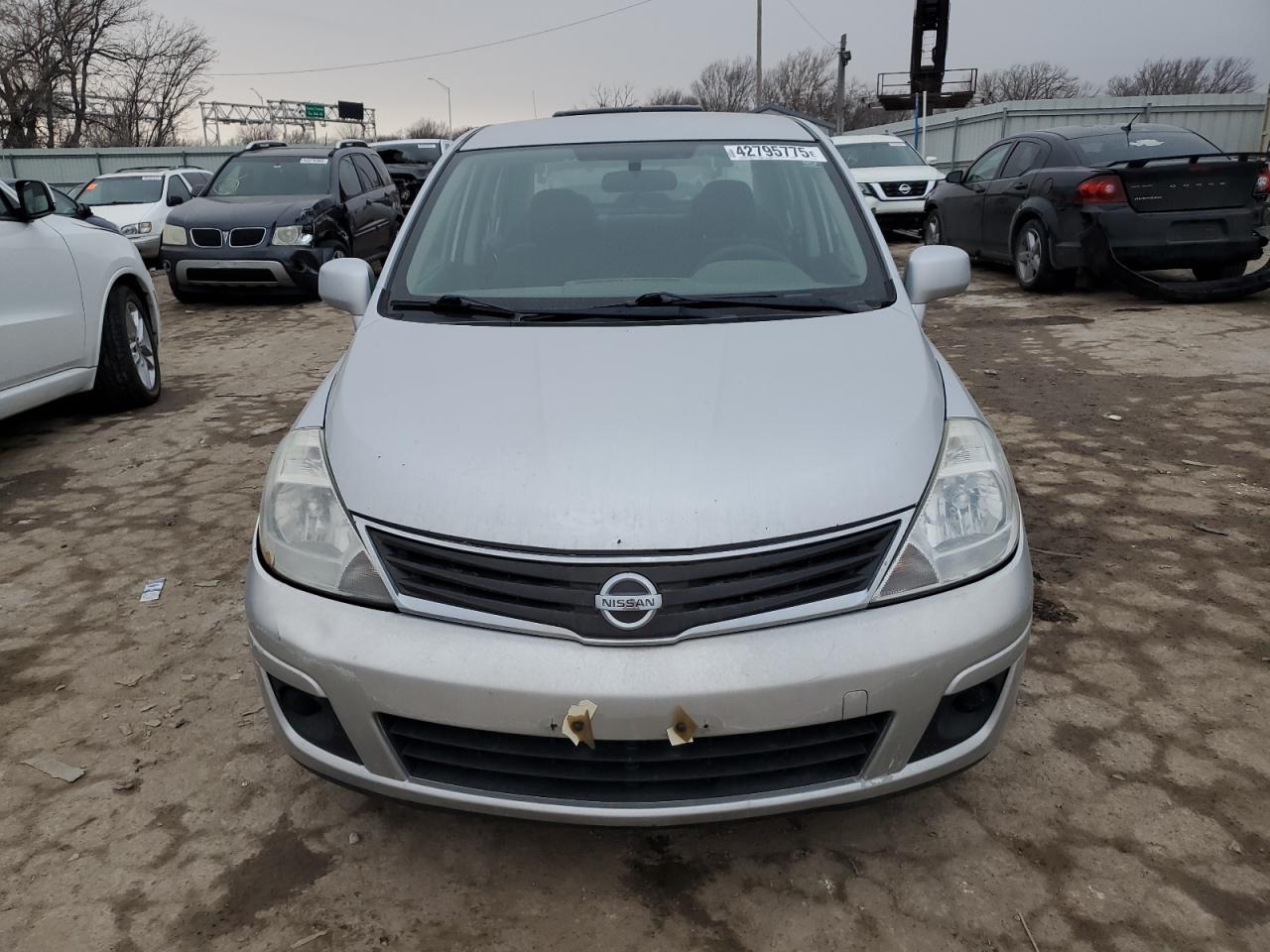 2011 Nissan Versa VIN 3N1BC1AP0BL470376 Copart auction photo, front end / side damage thumbnail 5