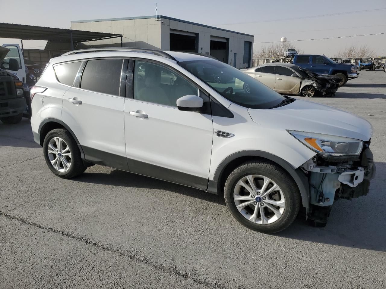 2018 Ford Escape VIN 1FMCU9GDXJUA42163 Copart auction photo, front end / side damage thumbnail 4